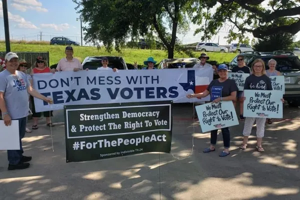 Jan McDowell (at right) stands up for voter rights in Texas