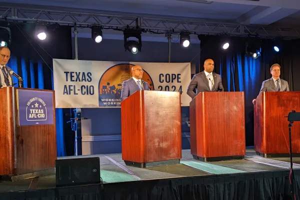Texas AFL-CIO President Rick Levy moderates a debate for Senate candidates