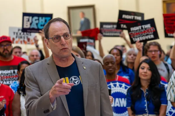 Rick Levy speaks at a Fight the Trump Takeover rally at the Texas Capitol