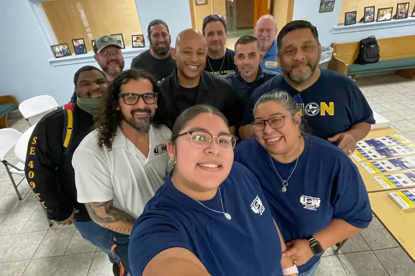 Port Arthur volunteers pose for a group photo before heading out for a block walk