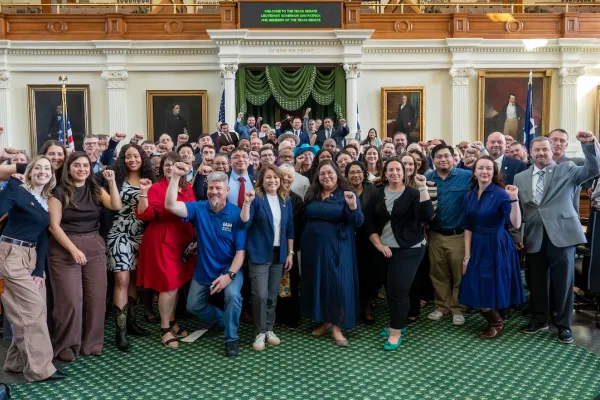 Union members at the swearing in of Senator Taylor Rehmet in Feb. 2026