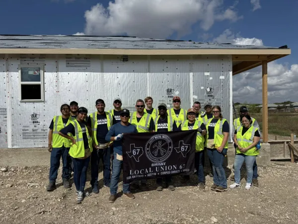 The brothers and sisters of SMART Local 67 (San Antonio) pose for a photo during their time volunteering with Habitat for Humanity.
